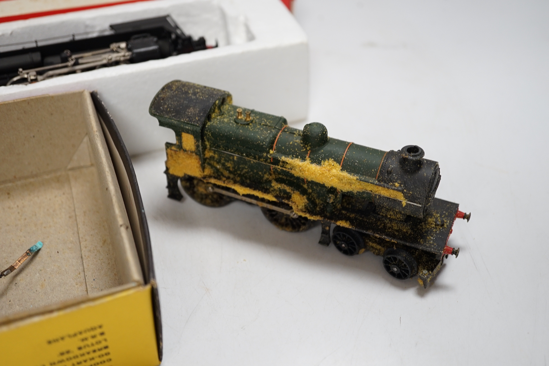 A quantity of 00 and HO gauge model, railway, including; a boxed Jouef SNCF 2–8–2, tender locomotive (8272), a Jouef SNCF clockwork train set, a Tri-ang Class L1 4-4-0 loco, (tender missing), an empty box for Hornby Dubl